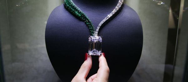 A necklace, known as Creation I, featuring a 163.41 carat D-Colour Flawless diamond, and created by Swiss jewellers de GRISOGONO, is pictured during a photocall. A necklace, known as Creation I, featuring a 163.41 carat D-Colour Flawless diamond, and created by Swiss jewellers de GRISOGONO, is pictured during a photocall. - Sputnik International