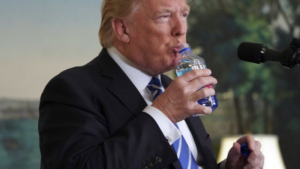 President Donald Trump pauses to drink water as he speaks in the Diplomatic Reception Room of the White House, Wednesday, Nov. 15, 2017 in Washington President Donald Trump pauses to drink water as he speaks in the Diplomatic Reception Room of the White House, Wednesday, Nov. 15, 2017 in Washington - Sputnik International