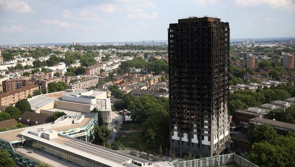 The burnt out remains of the Grenfell apartment tower are seen in North Kensington, London, Britain, June 18, 2017. - Sputnik International