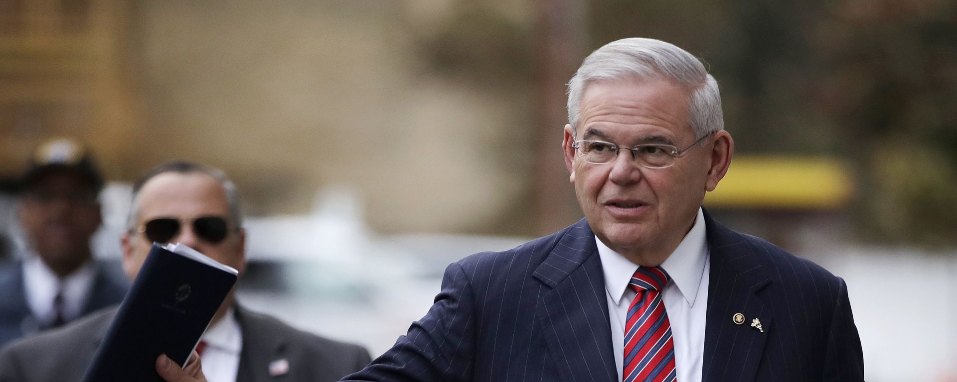 U.S. Sen. Bob Menendez waves at reporters before entering the Martin Luther King Jr. Federal Courthouse for his federal corruption trial, Thursday, Nov. 16, 2017, in Newark, N.J. Jury deliberations continued on Thursday morning. U.S. Sen. Bob Menendez waves at reporters before entering the Martin Luther King Jr. Federal Courthouse for his federal corruption trial, Thursday, Nov. 16, 2017, in Newark, N.J. Jury deliberations continued on Thursday morning. - Sputnik International, 1920, 27.09.2023