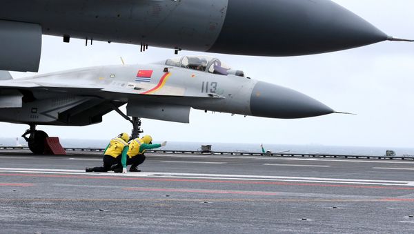 This photo taken on January 2, 2017 shows Chinese J-15 fighter jets on the deck of the Liaoning aircraft carrier during military drills in the South China Sea This photo taken on January 2, 2017 shows Chinese J-15 fighter jets on the deck of the Liaoning aircraft carrier during military drills in the South China Sea - Sputnik International