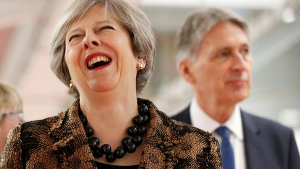 Britain's Prime Minister Theresa May and Chancellor of the Exchequer Philip Hammond visit an engineering training facility in the West Midlands, November 20, 2017. - Sputnik International