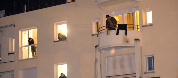 Migrants look at their windows in a former retirement house (image used for illustration purpose) - Sputnik International