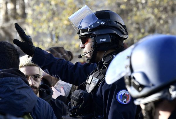 A police officer during a protest rally against changes to France's university admission rules, Paris - Sputnik International