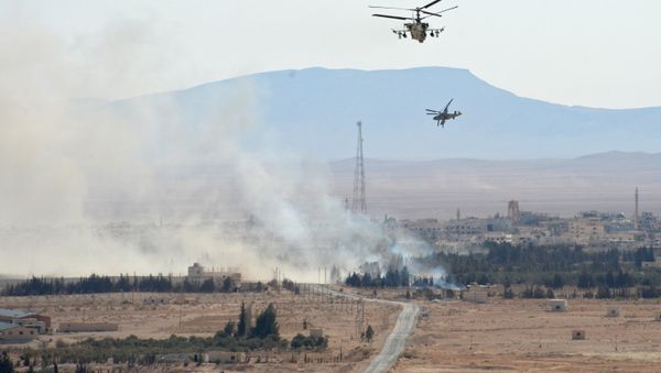 Kamov Ka-52 Hokum-B / Alligator attack helicopters operate near the Syrian city of Al Qaryatayn from which terrorists have been expelled. (File) - Sputnik International