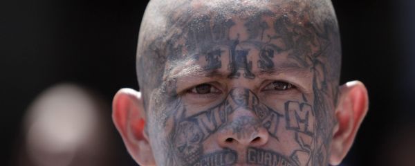 In this March 26, 2012 photo, an inmate belonging to the Mara Salvatrucha or MS-13 gang stands inside the prison in Ciudad Barrios, El Salvador. Six months after El Salvador brokered an historic truce between two rival gangs to curb the nation's daunting homicide rate, officials are split over whether the truce actually works. The gangs, which also operate in Guatemala and Honduras, are seeking truce talks in those countries as well. - Sputnik International