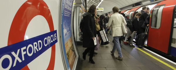 People board an underground Tube train at Oxford Circus underground station in London. (File) People board an underground Tube train at Oxford Circus underground station in London. (File) - Sputnik International