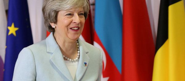 Britain's Prime Minister Theresa May attends the Eastern Partnership summit at the European Council Headquarters in Brussels, Belgium, November 24, 2017. Britain's Prime Minister Theresa May attends the Eastern Partnership summit at the European Council Headquarters in Brussels, Belgium, November 24, 2017. - Sputnik International