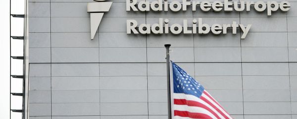 A sign on the headquarters of Radio Free Europe / Radio Liberty international broadcasting organization in Prague - Sputnik International