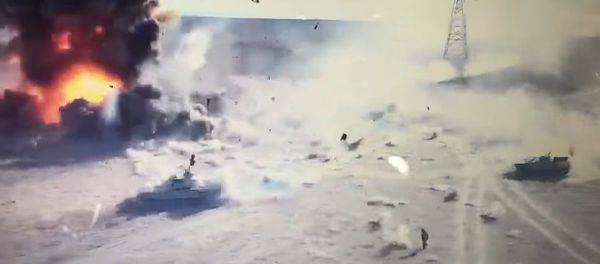 Screenshot of a video showing an Iraqi tanks and a terrorist vehicle - Sputnik International