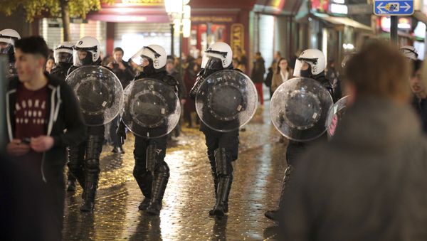 Belgian police march against demonstrators during unrest in Brussels on Wednesday, Nov. 15, 2017 Belgian police march against demonstrators during unrest in Brussels on Wednesday, Nov. 15, 2017 - Sputnik International