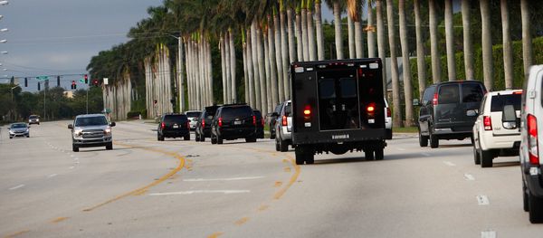 The motorcade of U.S. President Donald Trump arrives at Trump International Golf Club in West Palm Beach, Florida, U.S., November 25, 2017 The motorcade of U.S. President Donald Trump arrives at Trump International Golf Club in West Palm Beach, Florida, U.S., November 25, 2017 - Sputnik International