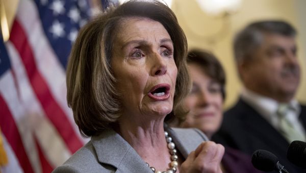 From left, House Minority Leader Nancy Pelosi of Calif., accompanied by Sen. Amy Klobuchar, D-Minn., and AFL-CIO President Richard Trumka, speaks at a news conference on American labor on Capitol Hill in Washington, Wednesday, Nov. 1, 2017 - Sputnik International