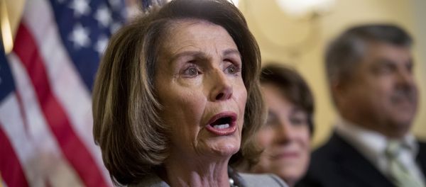 From left, House Minority Leader Nancy Pelosi of Calif., accompanied by Sen. Amy Klobuchar, D-Minn., and AFL-CIO President Richard Trumka, speaks at a news conference on American labor on Capitol Hill in Washington, Wednesday, Nov. 1, 2017 - Sputnik International