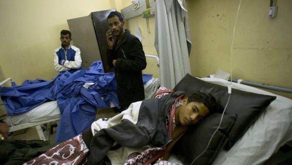 Abdallah Abdel Nasser, 14, receives medical treatment at Suez Canal University hospital in Ismailia, Egypt, Friday, Nov. 24, 2017, after he was in injured during an attack on a mosque - Sputnik International