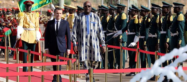 Burkina Faso's President Roch Marc Christian Kabore and French President Emmanuel Macron review troops during a welcoming ceremony at the Presidential Palace in Ouagadougou, Burkina Faso Burkina Faso's President Roch Marc Christian Kabore and French President Emmanuel Macron review troops during a welcoming ceremony at the Presidential Palace in Ouagadougou, Burkina Faso - Sputnik International