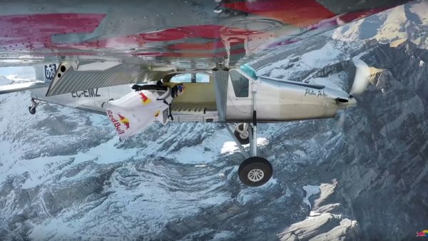 2 wingsuit flyers BASE jump into a plane in mid-air. | A Door In The Sky - Sputnik International