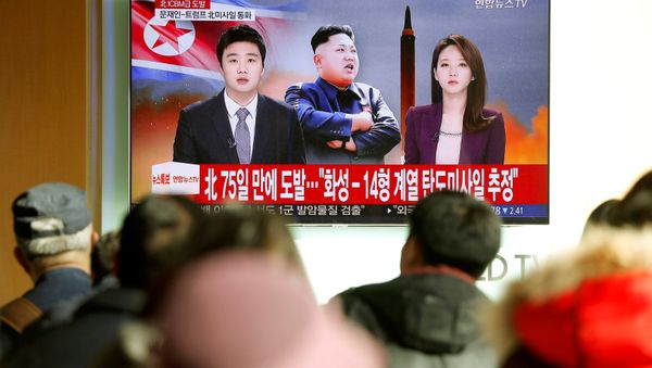 People watch a TV broadcasting a news report on North Korea firing what appeared to be an intercontinental ballistic missile (ICBM) that landed close to Japan, in Seoul, South Korea, November 29, 2017 People watch a TV broadcasting a news report on North Korea firing what appeared to be an intercontinental ballistic missile (ICBM) that landed close to Japan, in Seoul, South Korea, November 29, 2017 - Sputnik International