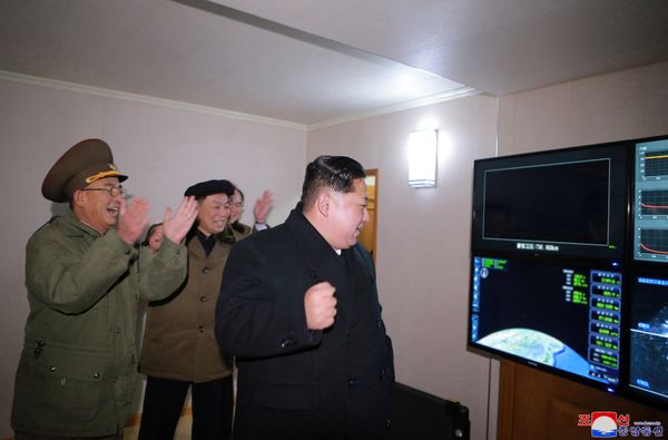 North Korea's leader Kim Jong-un is seen as the newly developed intercontinental ballistic rocket Hwasong-15's test was successfully launched, in this undated photo released by North Korea's Korean Central News Agency (KCNA) in Pyongyang November 30, 2017 North Korea's leader Kim Jong-un is seen as the newly developed intercontinental ballistic rocket Hwasong-15's test was successfully launched, in this undated photo released by North Korea's Korean Central News Agency (KCNA) in Pyongyang November 30, 2017 - Sputnik International