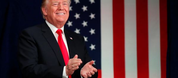US President Donald Trump smiles as he arrives to speak about tax reform legislation in St. Louis, Missouri, US November 29, 2017. R US President Donald Trump smiles as he arrives to speak about tax reform legislation in St. Louis, Missouri, US November 29, 2017. R - Sputnik International