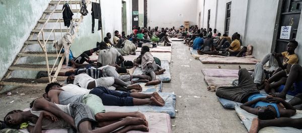 Illegal immigrants are seen at a detention centre in Zawiyah, 45 kilometres west of the Libyan capital Tripoli, on June 17, 2017 Illegal immigrants are seen at a detention centre in Zawiyah, 45 kilometres west of the Libyan capital Tripoli, on June 17, 2017 - Sputnik International