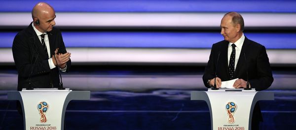 FIFA president Gianni Infantino, left, and Russian President Vladimir Putin open the 2018 soccer World Cup draw in the Kremlin in Moscow FIFA president Gianni Infantino, left, and Russian President Vladimir Putin open the 2018 soccer World Cup draw in the Kremlin in Moscow - Sputnik International