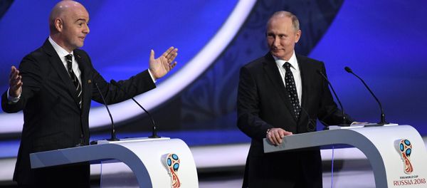 FIFA president Gianni Infantino, left, and Russian President Vladimir Putin open the 2018 soccer World Cup draw in the Kremlin in Moscow FIFA president Gianni Infantino, left, and Russian President Vladimir Putin open the 2018 soccer World Cup draw in the Kremlin in Moscow - Sputnik International