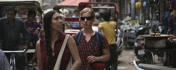 In this Tuesday, April 2, 2013 photo, foreign tourists walk on a street near the railway station in New Delhi, India - Sputnik International