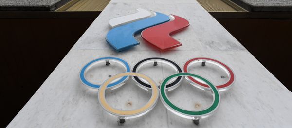 The Olympic rings are seen on the facade of the Russian Olympic Committee (ROC) building in Moscow - Sputnik International