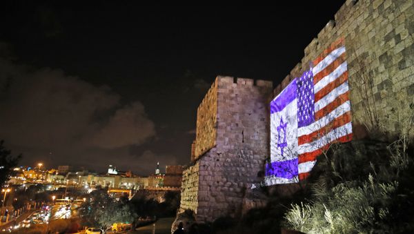 Giant US flag screened alongside Israel's national flag by the Jerusalem municipality on the walls of the old city Giant US flag screened alongside Israel's national flag by the Jerusalem municipality on the walls of the old city - Sputnik International