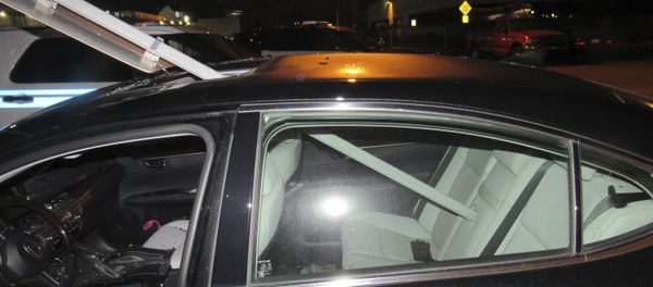A photo provided by the South Hackensack Police Department shows a car with a mass transit sign sticking out of the roof. A photo provided by the South Hackensack Police Department shows a car with a mass transit sign sticking out of the roof. - Sputnik International