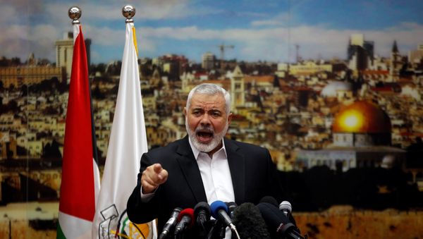 Hamas Chief Ismail Haniyeh gestures as he delivers a speech over U.S. President Donald Trump's decision to recognize Jerusalem as the capital of Israel, in Gaza City December 7, 2017 - Sputnik International