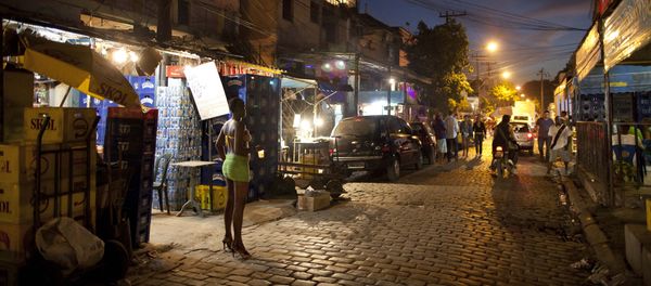 In this photo taken May 25, 2011, A sex worker waits for customers at the Vila Mimosa prostitution zone in Rio de Janeiro, Brazil In this photo taken May 25, 2011, A sex worker waits for customers at the Vila Mimosa prostitution zone in Rio de Janeiro, Brazil - Sputnik International