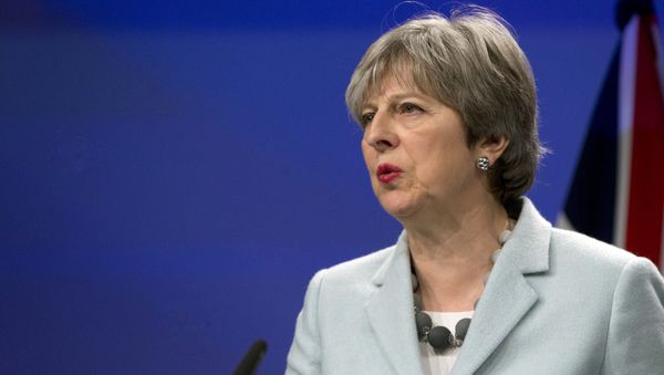 British Prime Minister Theresa May speaks during a media conference with European Commission President Jean-Claude Juncker at EU headquarters in Brussels on Friday, Dec. 8, 2017. British Prime Minister Theresa May speaks during a media conference with European Commission President Jean-Claude Juncker at EU headquarters in Brussels on Friday, Dec. 8, 2017. - Sputnik International