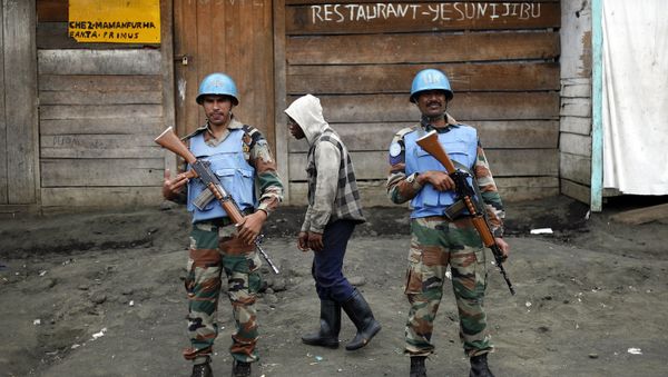 Two UN soldiers stand guard in Goma, Democratic Republic of Congo. (File) Two UN soldiers stand guard in Goma, Democratic Republic of Congo. (File) - Sputnik International