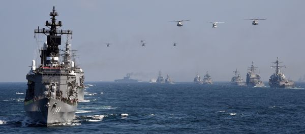 Japan's Maritime Self-Defense Force (MSDF) escort ship Kurama (L) takes part in a fleet review off Sagami Bay, Kanagawa prefecture (File) Japan's Maritime Self-Defense Force (MSDF) escort ship Kurama (L) takes part in a fleet review off Sagami Bay, Kanagawa prefecture (File) - Sputnik International