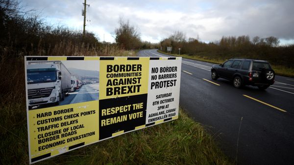 A sign from Border Communities Against Brexit is seen on the borderline between County Cavan in Ireland and County Fermanagh in Northern Ireland near Woodford, Ireland, November 30, 2017 A sign from Border Communities Against Brexit is seen on the borderline between County Cavan in Ireland and County Fermanagh in Northern Ireland near Woodford, Ireland, November 30, 2017 - Sputnik International