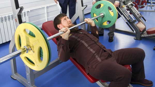 Chechnya's leader Ramzan Kadyrov lifts weight in a gym as he visits the Chechen State University in Chechnya's capital Grozny, Russia, 11 August 2016 - Sputnik International
