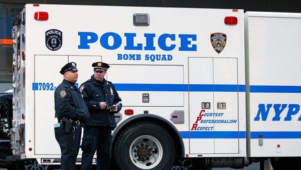 Police officers stand outside the New York Port Authority in New York City, U.S. December 11, 2017 after reports of an explosion - Sputnik International