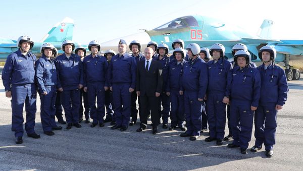 Russian President Vladimir Putin visits the Hmeymim Airbase in Syria on December 11, 2017 Russian President Vladimir Putin visits the Hmeymim Airbase in Syria on December 11, 2017 - Sputnik International