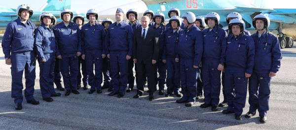 Russian President Vladimir Putin visits the Hmeymim Airbase in Syria on December 11, 2017 - Sputnik International