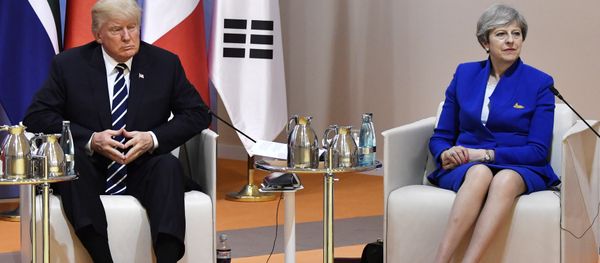 US President Donald Trump and Britain's Prime Minister Theresa May sit at the start of the retreat meeting on the first day of the G-20 summit in Hamburg, northern Germany, on Friday July 7, 2017. US President Donald Trump and Britain's Prime Minister Theresa May sit at the start of the retreat meeting on the first day of the G-20 summit in Hamburg, northern Germany, on Friday July 7, 2017. - Sputnik International