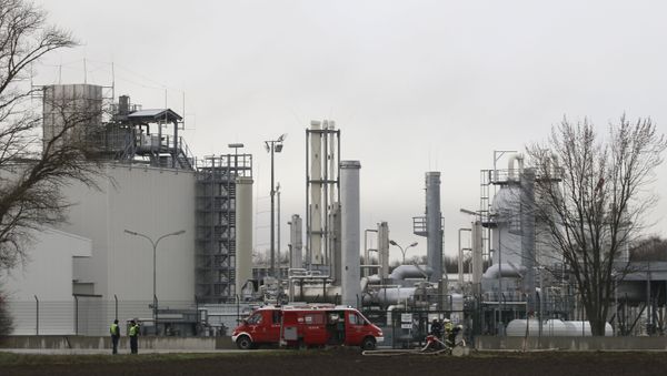 Firefighters stand outside a gas plant after an explosion occured near Baumgarten an der March, Austria, Tuesday, Dec. 12, 2017 Firefighters stand outside a gas plant after an explosion occured near Baumgarten an der March, Austria, Tuesday, Dec. 12, 2017 - Sputnik International
