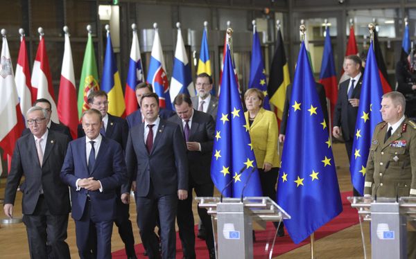 European Council President Donald Tusk, front center, and European Commission President Jean-Claude Juncker, front left, lead EU leaders to a group photo at an EU summit at the Europa building in Brussels on Thursday, Dec. 14, 2017 European Council President Donald Tusk, front center, and European Commission President Jean-Claude Juncker, front left, lead EU leaders to a group photo at an EU summit at the Europa building in Brussels on Thursday, Dec. 14, 2017 - Sputnik International