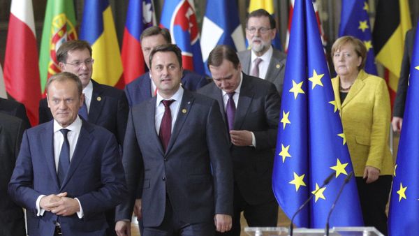 European Council President Donald Tusk, front center, and European Commission President Jean-Claude Juncker, front left, lead EU leaders to a group photo at an EU summit at the Europa building in Brussels on Thursday, Dec. 14, 2017 - Sputnik International