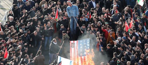 Demonstrators set U.S. and Israeli flags on fire during a protest against U.S. President Donald Trump's recognition of Jerusalem as Israel's capital, in Istanbul, Turkey December 10, 2017 - Sputnik International
