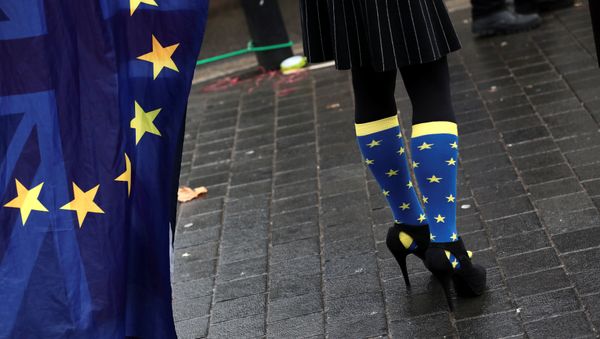 An anti-Brexit protester wears EU flag inspired socks outside the Houses of Parliament in London, Britain, December 13, 2017 An anti-Brexit protester wears EU flag inspired socks outside the Houses of Parliament in London, Britain, December 13, 2017 - Sputnik International