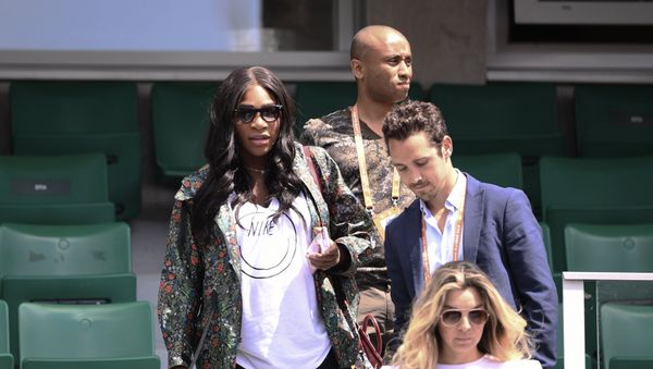 Serena Williams (L) of the US leaves after attending her sister US Venus Williams' tennis match against Japan's Kurumi Nara at the Roland Garros 2017 French Open on May 31, 2017 in Paris Serena Williams (L) of the US leaves after attending her sister US Venus Williams' tennis match against Japan's Kurumi Nara at the Roland Garros 2017 French Open on May 31, 2017 in Paris - Sputnik International