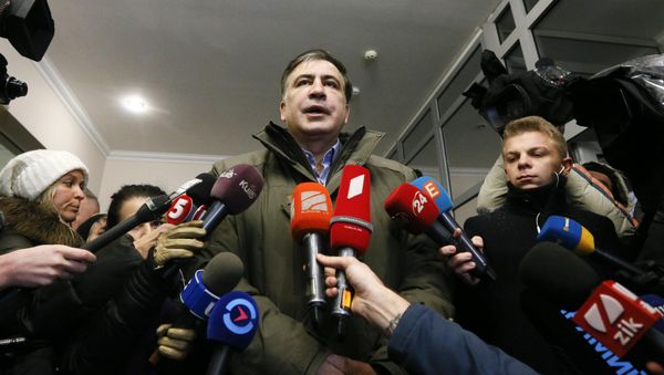 Ukrainian opposition figure and Georgian former President Mikheil Saakashvili (C) addresses journalists as he visits the General Prosecutor's Office in Kiev, Ukraine December 18, 2017 Ukrainian opposition figure and Georgian former President Mikheil Saakashvili (C) addresses journalists as he visits the General Prosecutor's Office in Kiev, Ukraine December 18, 2017 - Sputnik International