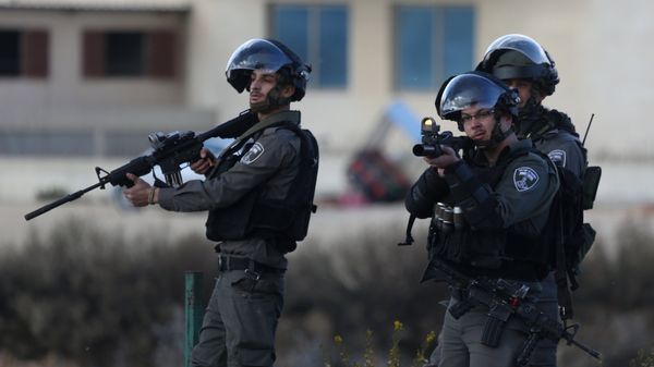 Israeli soldiers during clashes with protesters in Palestine against the decision to recognize Jerusalem as the capital of Israel - Sputnik International